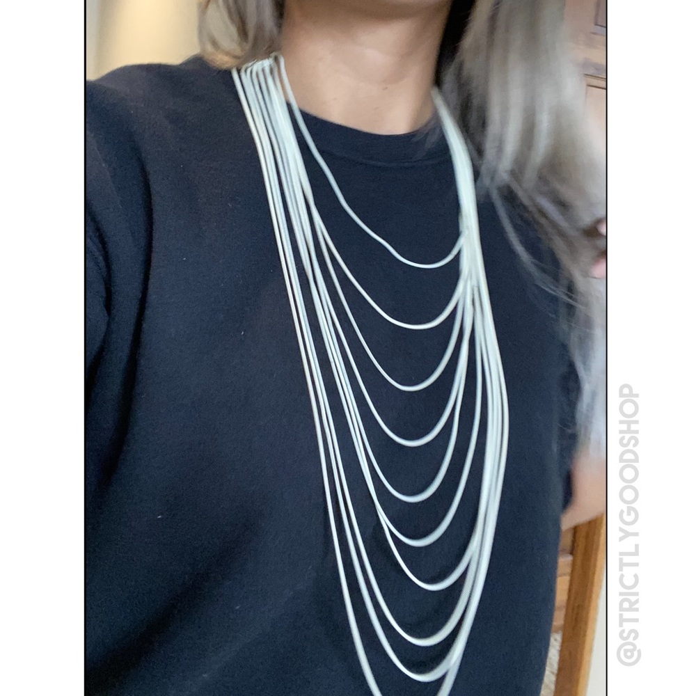 Unique cascading white chain necklace